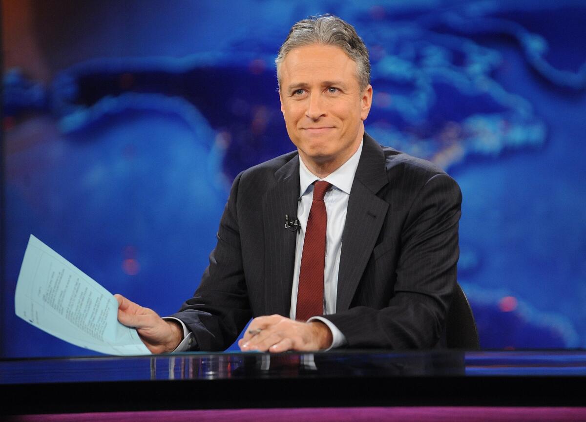 Jon Stewart, shown here on a 2011 show, began his final week on "The Daily Show" with a vigorous counterattack on Fox News.
