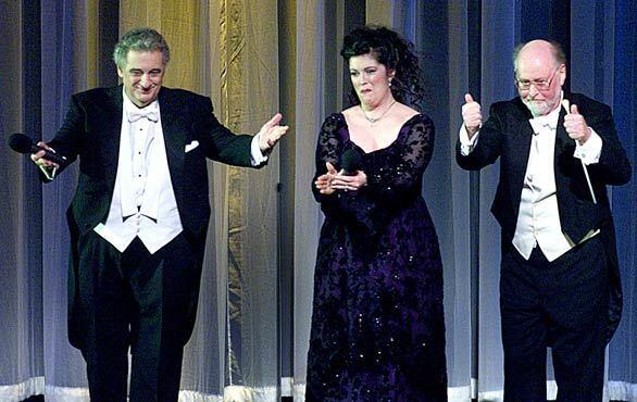 Placido Domingo, left, Jennifer Larmore and conductor John Williams acknowledged the audience after a song at the Welcome Concert and Gala honoring Placido Domingo at the Dorothy Chandler Pavilion in 2001.