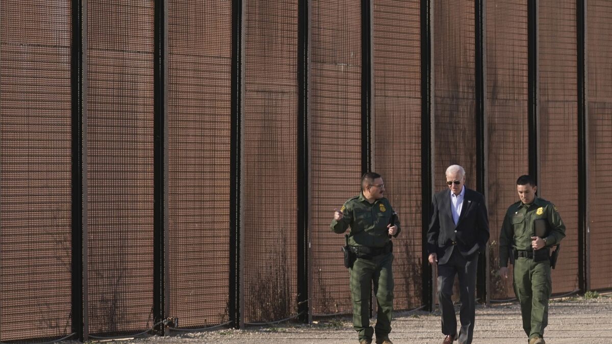 Under attack from both Republicans and Democrats, Biden tours border 
