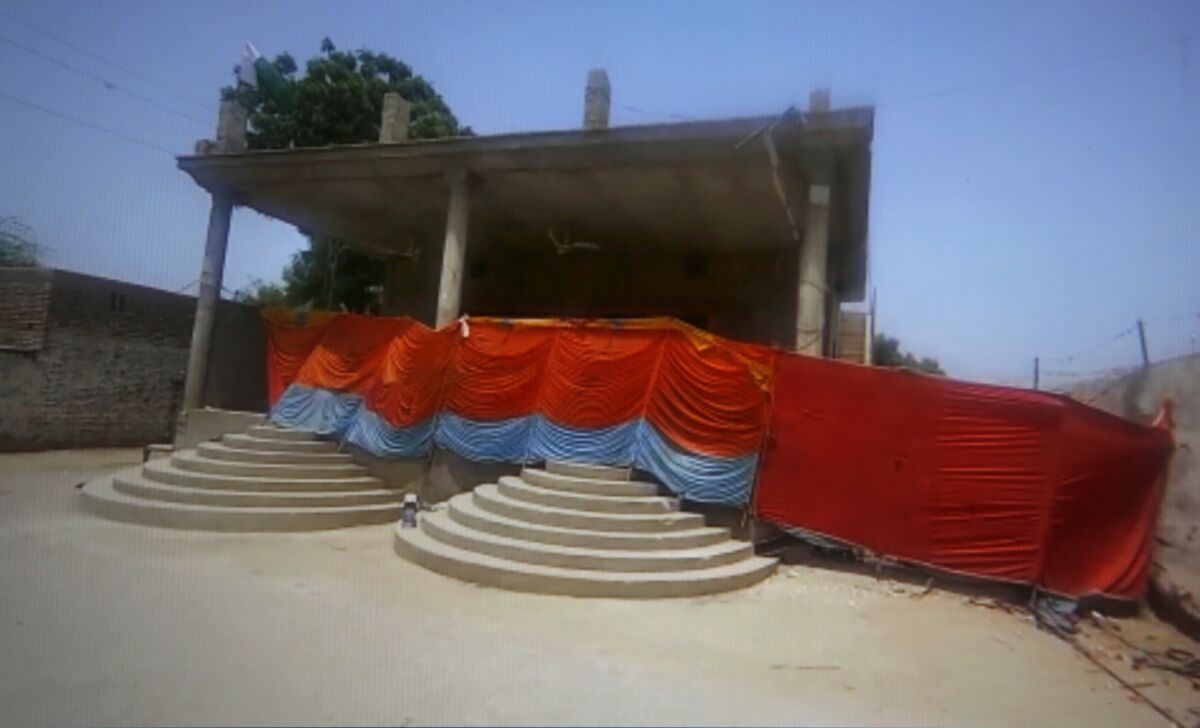 This frame grab image from video, shows a Hindu temple cordoned off by local authorities after it was stormed by a Muslim mob, in Bhong, in Rahim Yar Khan district, Pakistan, Thursday, Aug. 5, 2021. Pakistan on Thursday deployed paramilitary troops in a conservative town in the country's eastern Punjab province to avoid any communal violence after a Muslim mob badly damaged a Hindu temple there. Wednesday's attack happened after a court granted bail to an eight-year-old Hindu boy who allegedly desecrated a madrassa, or religious school, earlier this week. (AP Photo)