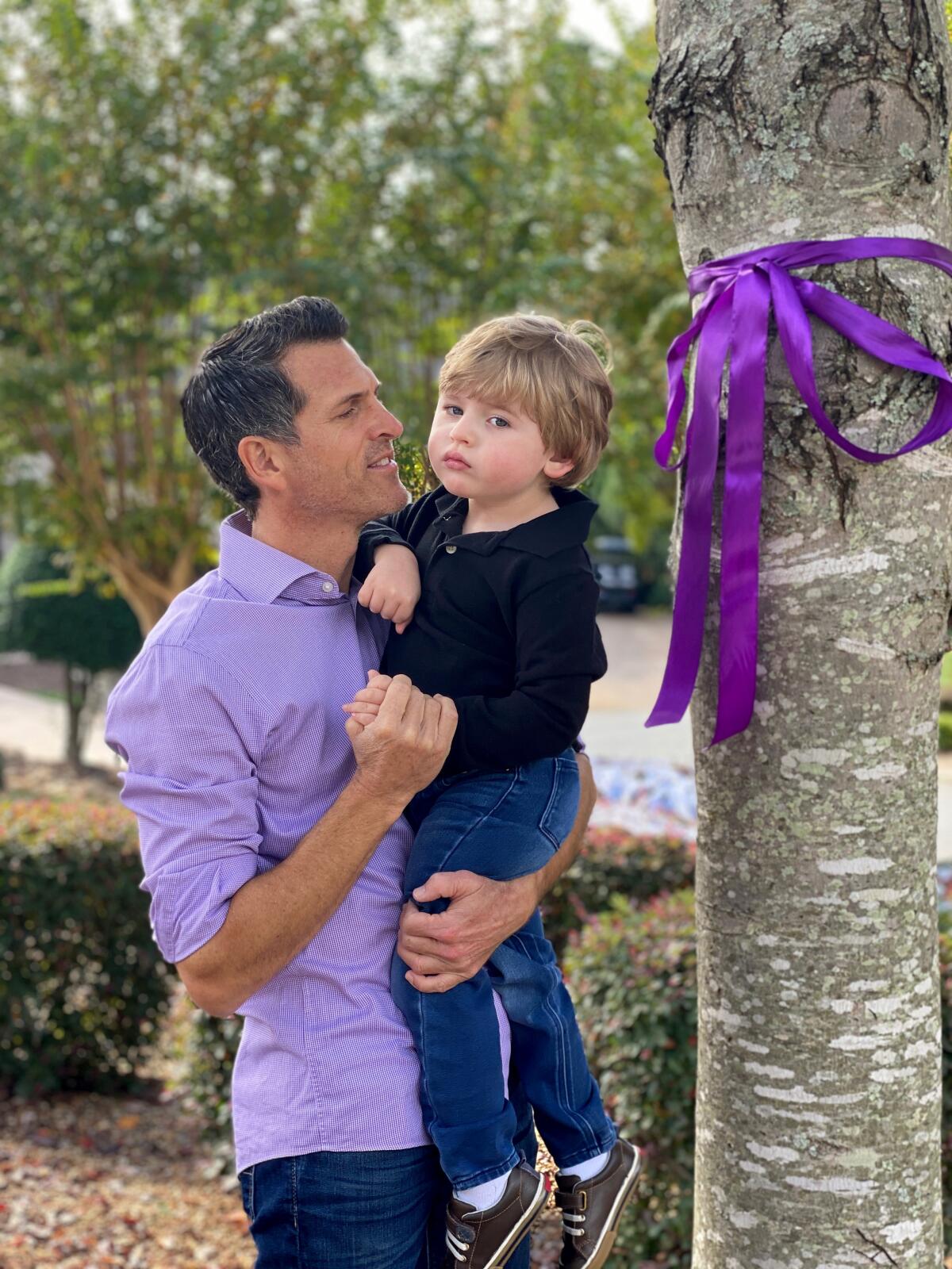 Dr. Justin West with his son, Andrew.