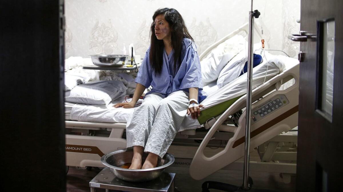 Indian Everest climber Ameesha Chauhan recovers from frostbite in a Katmandu hospital on May 27, 2019. She says climbers without sufficient skills should be barred from the mountain to prevent a recurrence of this year's deadly, crowded season on the world's highest peak.