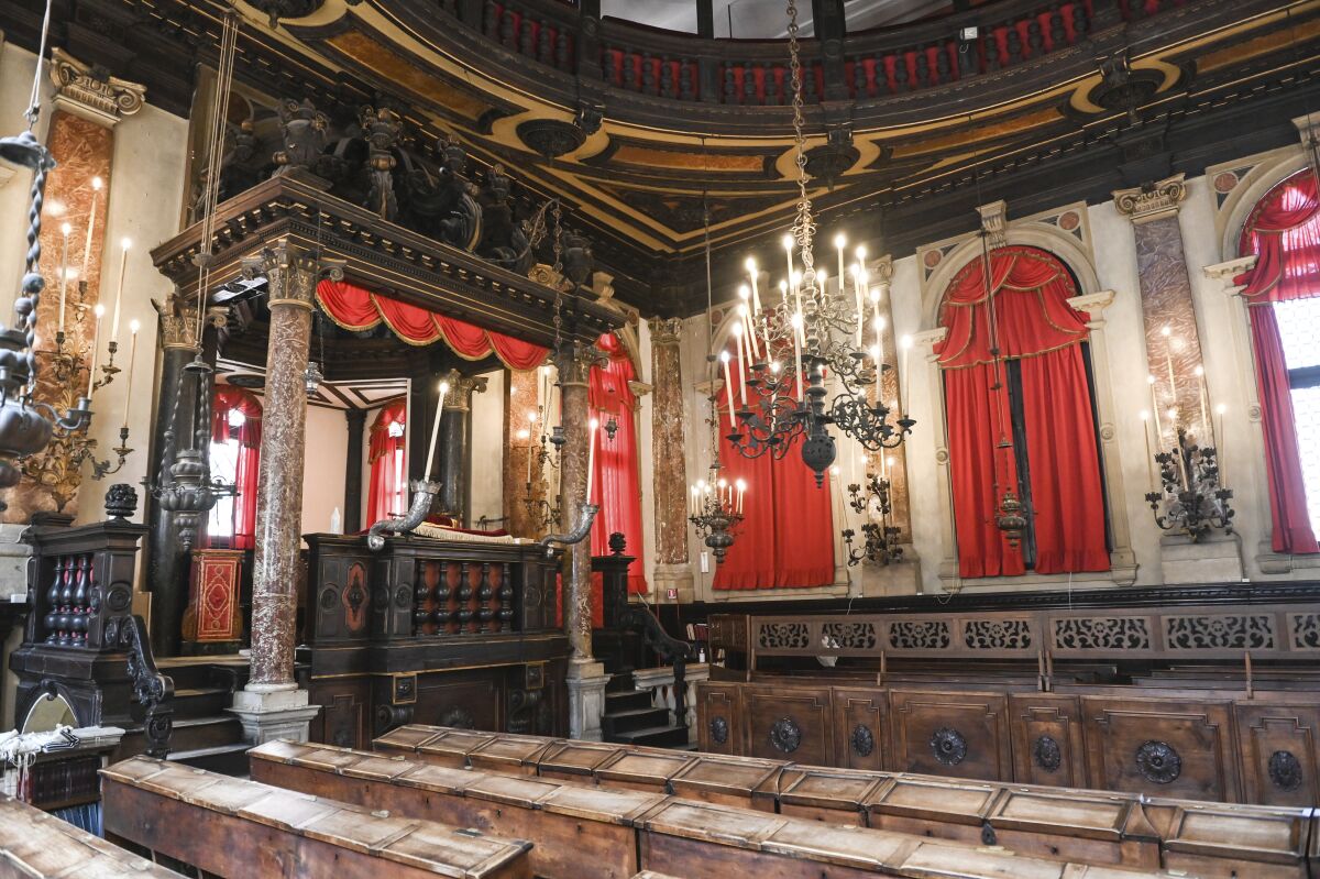 Interiors of the Spanish Schola Synagogue in Venice, northern Italy, are seen in this picture taken on Wednesday, June 1, 2022. The Spanish Schola, founded about 1580, but rebuilt in the first half of the 17th century, is the biggest of the Venetian synagogues. Venice’s Jewish ghetto is considered the first in Europe and one of the first in the world, and a new effort is underway to preserve its 16th century synagogues for the Jews who have remained and tourists who pass through. (AP Photo/Chris Warde-Jones)
