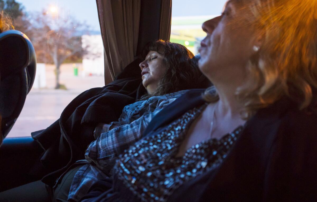 Once on the bus back to Madrid, the women soon settle into sleep.