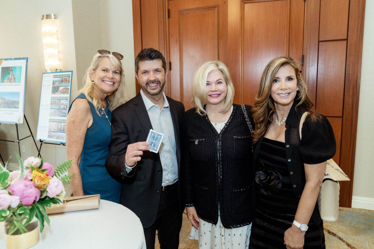 Nancy Silver, from left, John Gustaferro, Barb Maccabe and Yvette McCarthy gather in support of Orangewood Foundation.