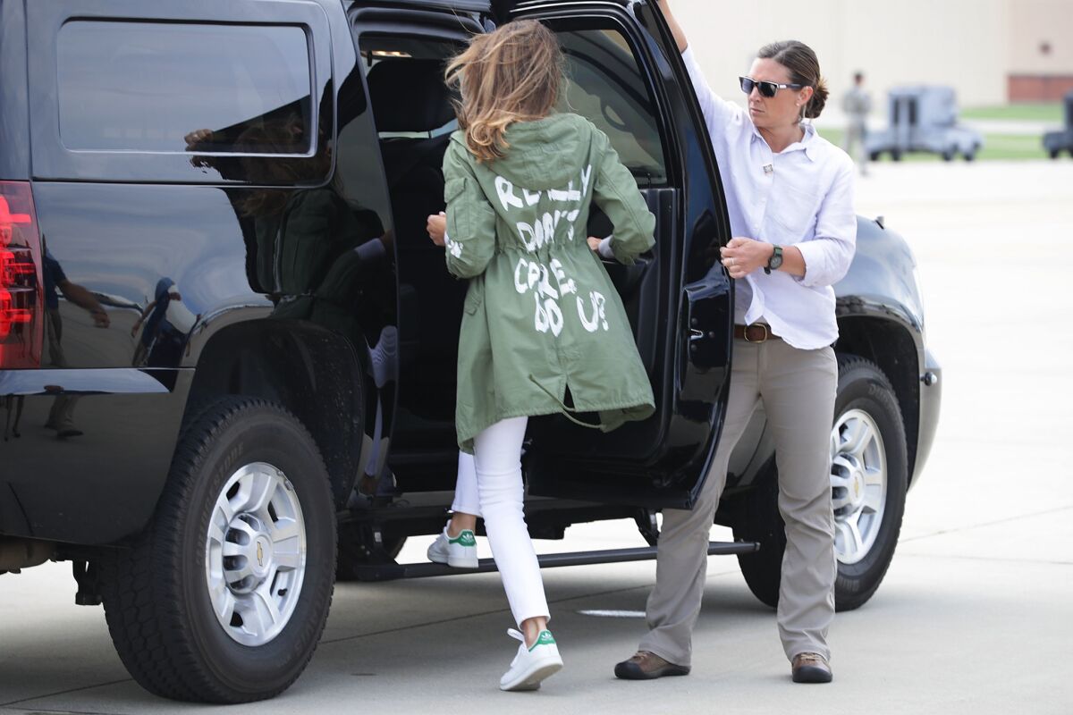 First Lady Melania Trump climbs into the back of an SUV on Thursday at Joint Base Andrews, Maryland, after traveling to Texas to visit facilities that house and care for children taken from their parents at the U.S.-Mexico border.