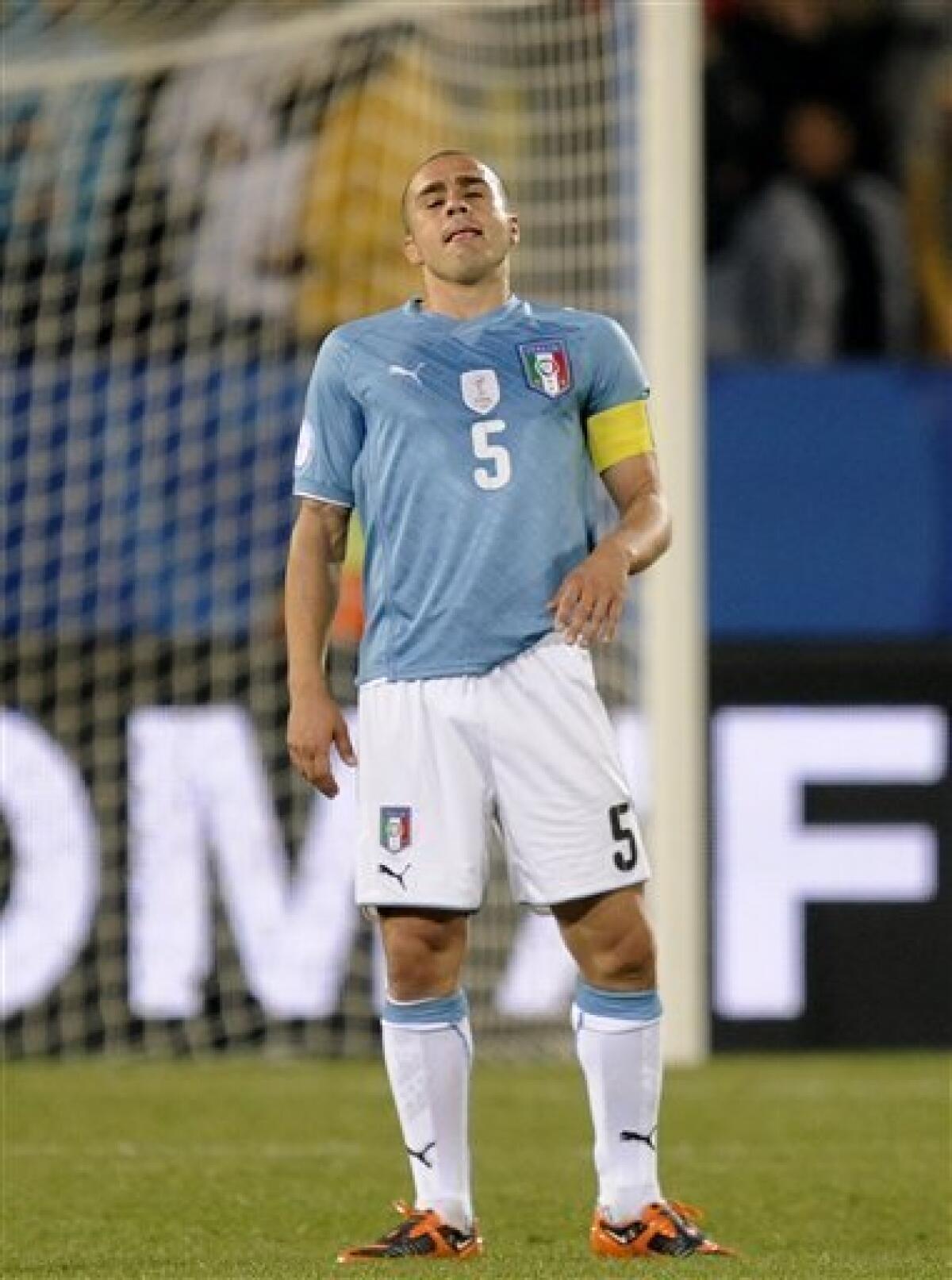 FILE - In this Sunday, June 21, 2009 file photo, Italy's Fabio Cannavaro reacts after teammate Andrea Dossena, not pictured, scored an own goal during their Confederations Cup Group B soccer match against Brazil, at Loftus Versfeld Stadium in Pretoria, South Africa. Italy captain Fabio Cannavaro has failed a doping test. His club team Juventus says, Thursday, Oct. 8, 2009, the positive exam was the result of a cortisone used to treat a bee sting. The Italian Olympic Committee's anti-doping prosecutor Ettore Torri has opened an investigation. Cannavaro was already suspended for Italy's World Cup qualifier with Ireland on Saturday, but he was expected to join the team for Wednesday's game against Cyprus. (AP Photo/Martin Meissner, File)