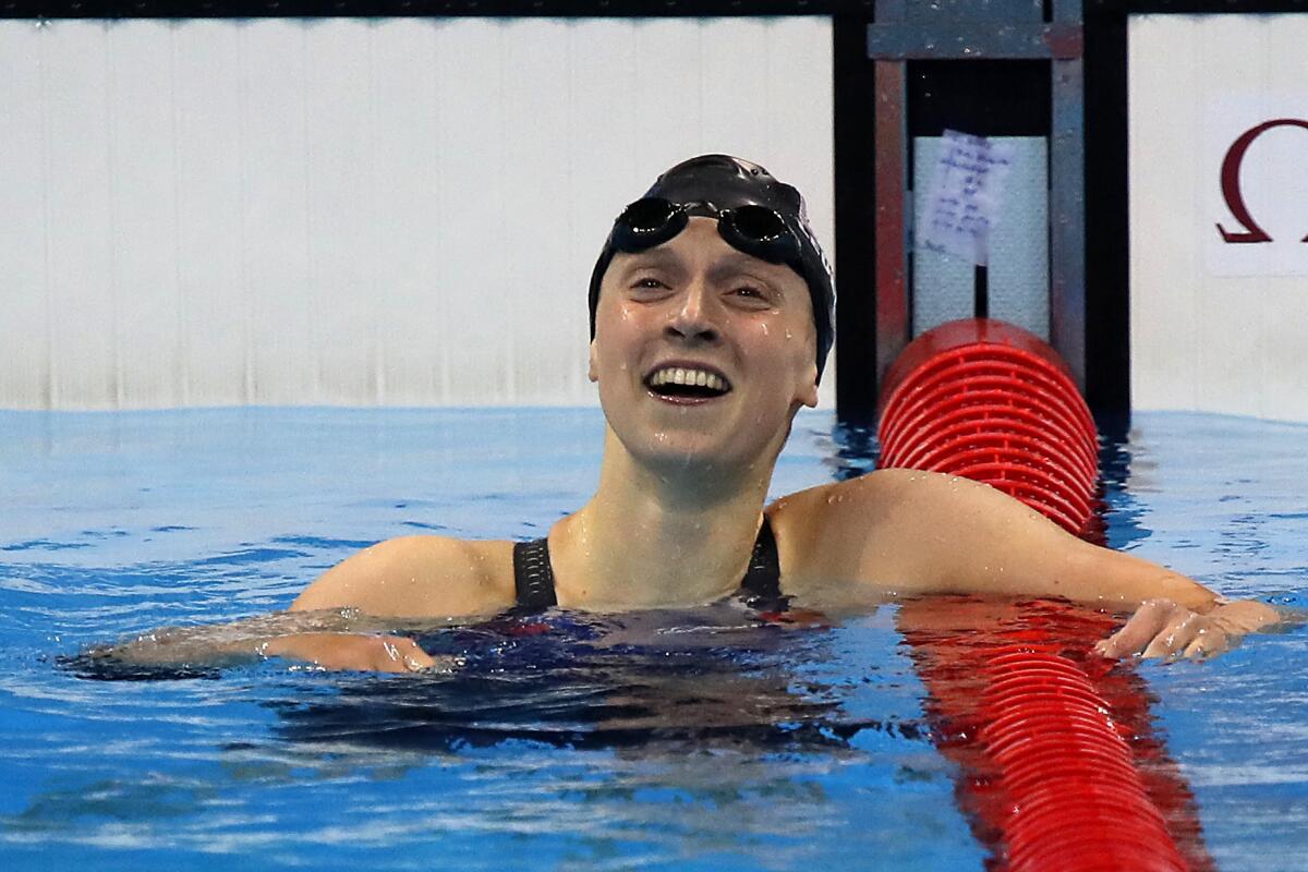 Katie Ledecky is all smiles after winning the women's 200-meter freestyle at the Rio Olympics on Tuesday.