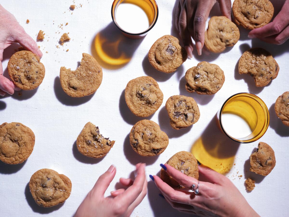 Los Angeles Times test kitchen staff members reach for chocolate chip cookies 