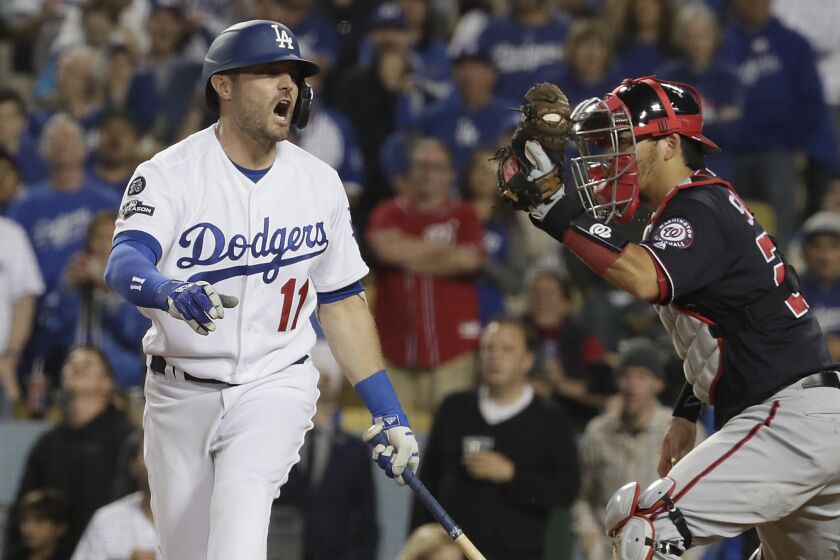 LOS ANGELES, CA, FRIDAY, OCTOBER 4, 2019 - Los Angeles Dodgers center fielder A.J. Pollock (11) yells out in frustration after striking out in the ninth inning in game two of the National League Division Series at Dodger Stadium. (Robert Gauthier/Los Angeles Times)