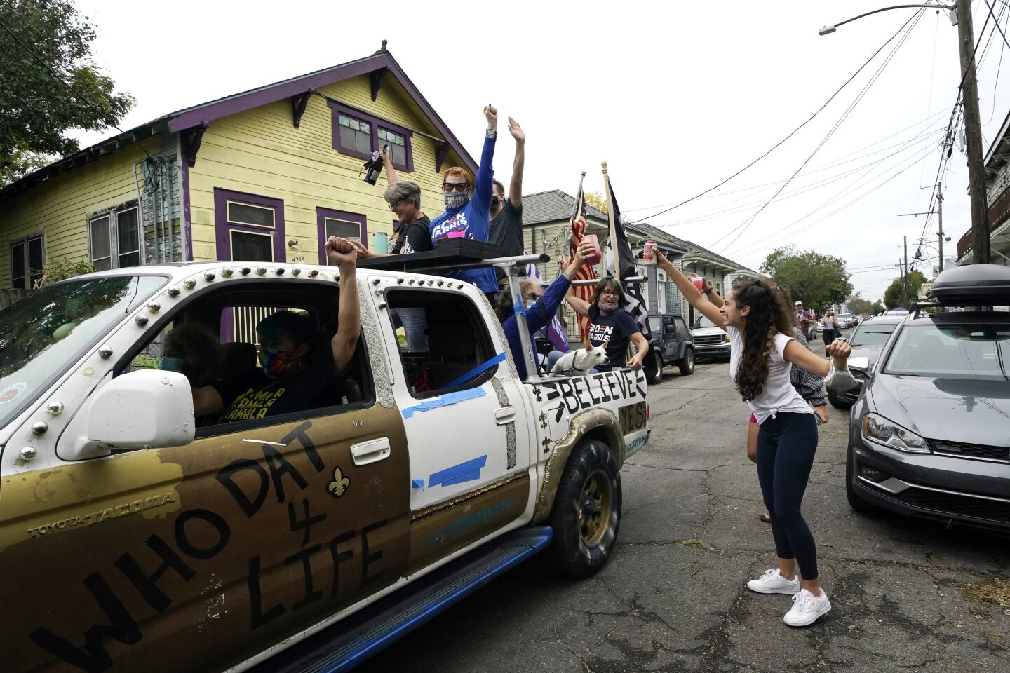 People celebrate in New Orleans after news organizations called the presidential election in favor of Joe Biden