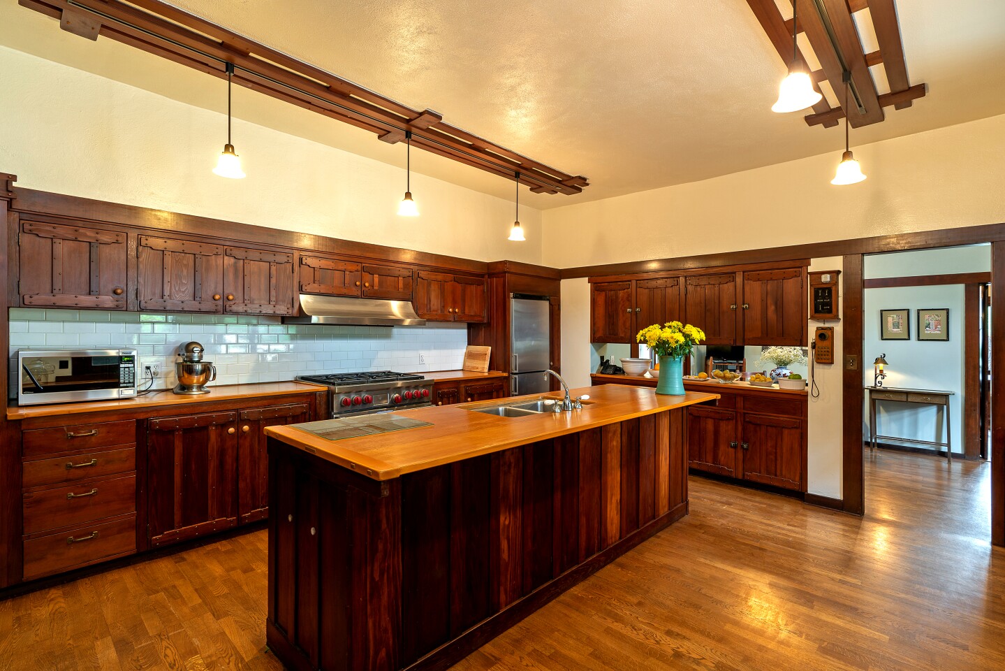 The Duncan-Irwin House in Pasadena has such Craftsman features as overhanging eaves, exposed rafter tails and clinker bricks. (Erik Grammer and Giovanni Rida for Sotheby’s International Realty)