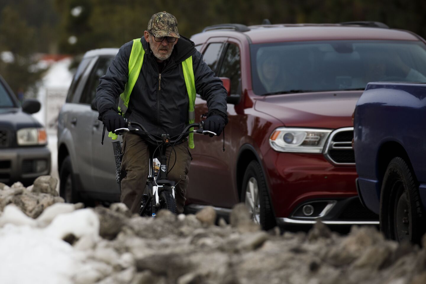 James Doolittle, 78, a Big Bear resident since 1963, bikes to the market.