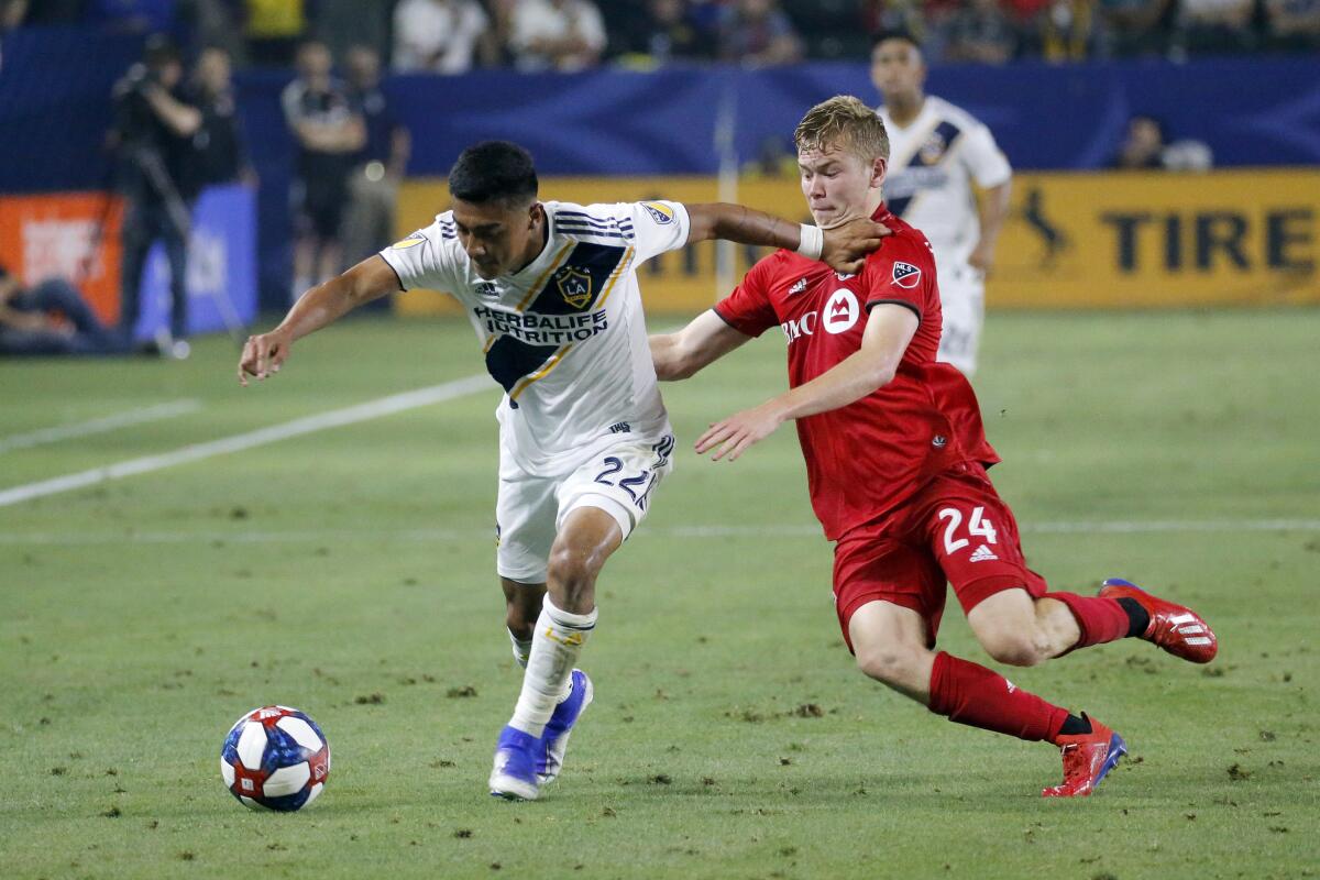 Galaxy defender Julian Araujo, left, is hoping to make a impact on the U.S. men's national team in the years ahead.