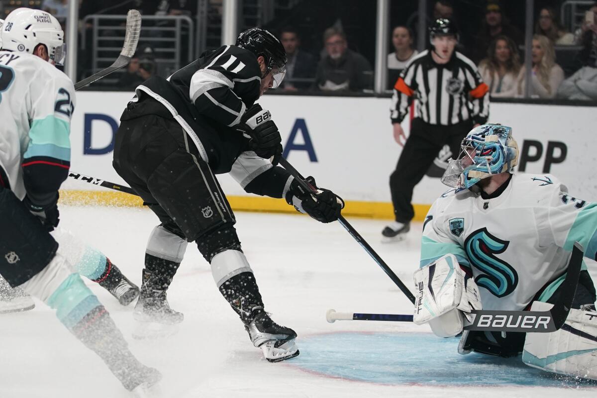 Kings center Anze Kopitar scores on Seattle Kraken goaltender Philipp Grubauer.