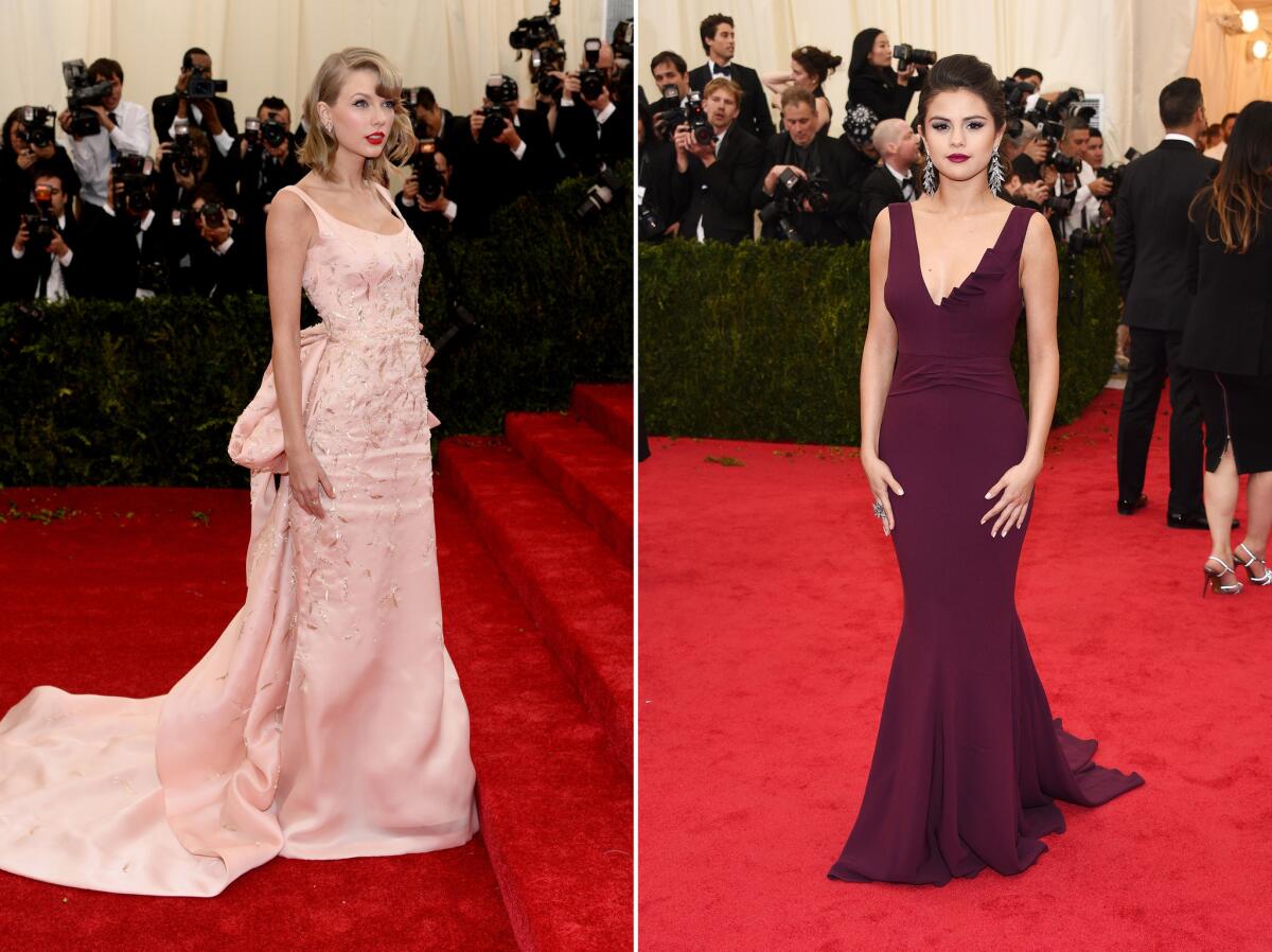 Taylor Swift, left, and Selena Gomez on the red carpet at the 2014 Met Gala in New York.