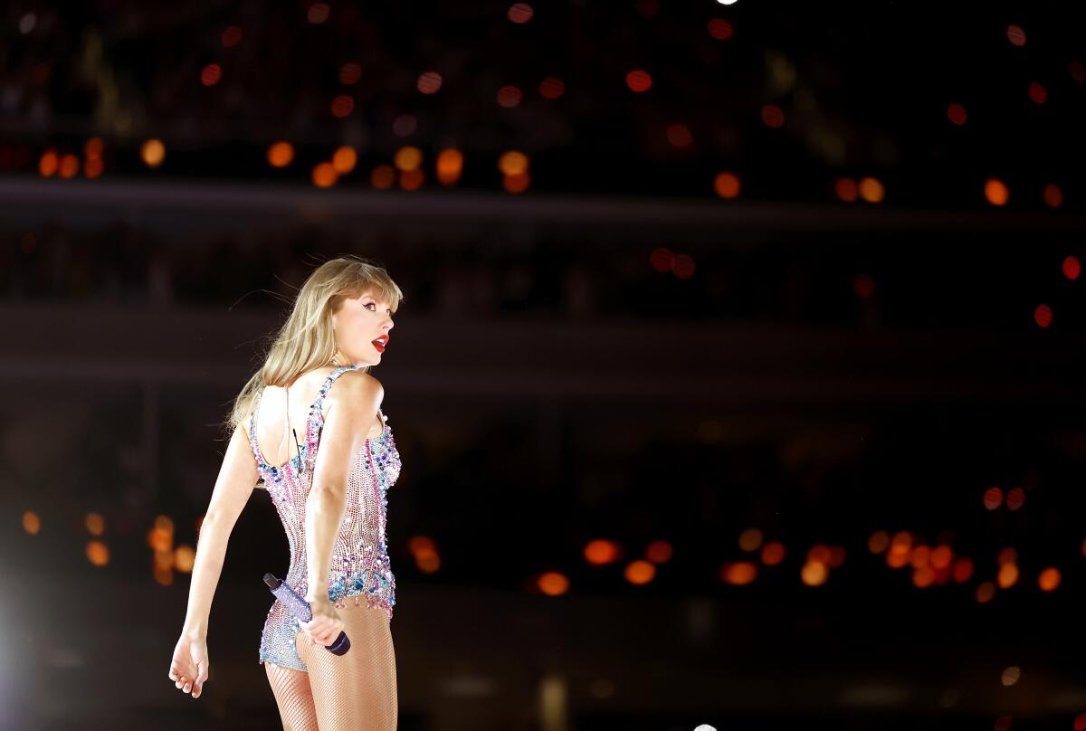 Taylor Swift at SoFi Stadium in a sparkly leotard.