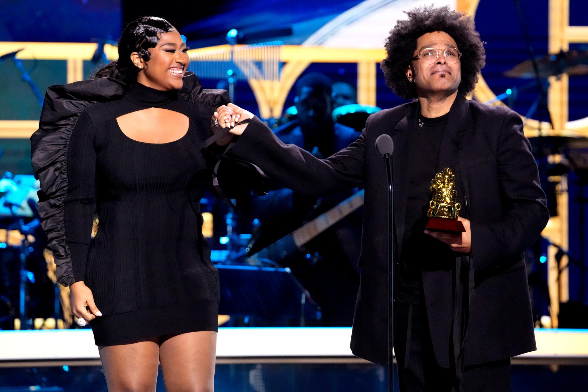 Jazmine Sullivan presents Maxwell with the Living Legend Award at the Soul Train Music Awards