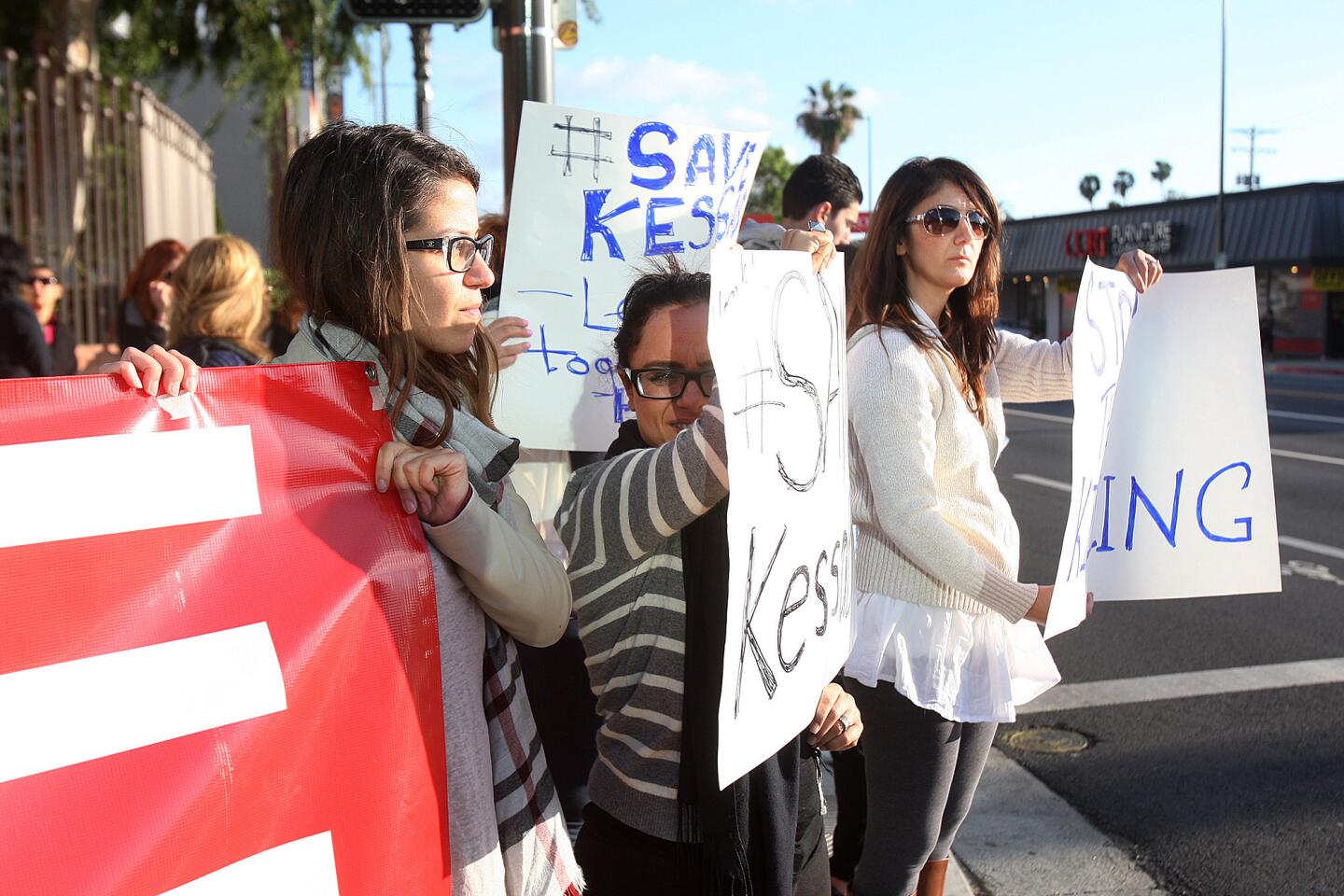 Arpi Nersessian, of Burbank, Sarineh Ratousi, of Glendale, and Rina Minassian, of Grenada Hills, hold signs to bring awareness to the assault on Kessab, Syria, in front of the Consulate General Of Armenia in Los Angeles in Glendale on the corner of Central Avenue and Lexington Drive on Monday, March 31, 2014. Kessab is in Syria and was attacked by Al-Qaeda rebels, and local Armenians are gathering at the Consulate to bring attention to the atrocity.