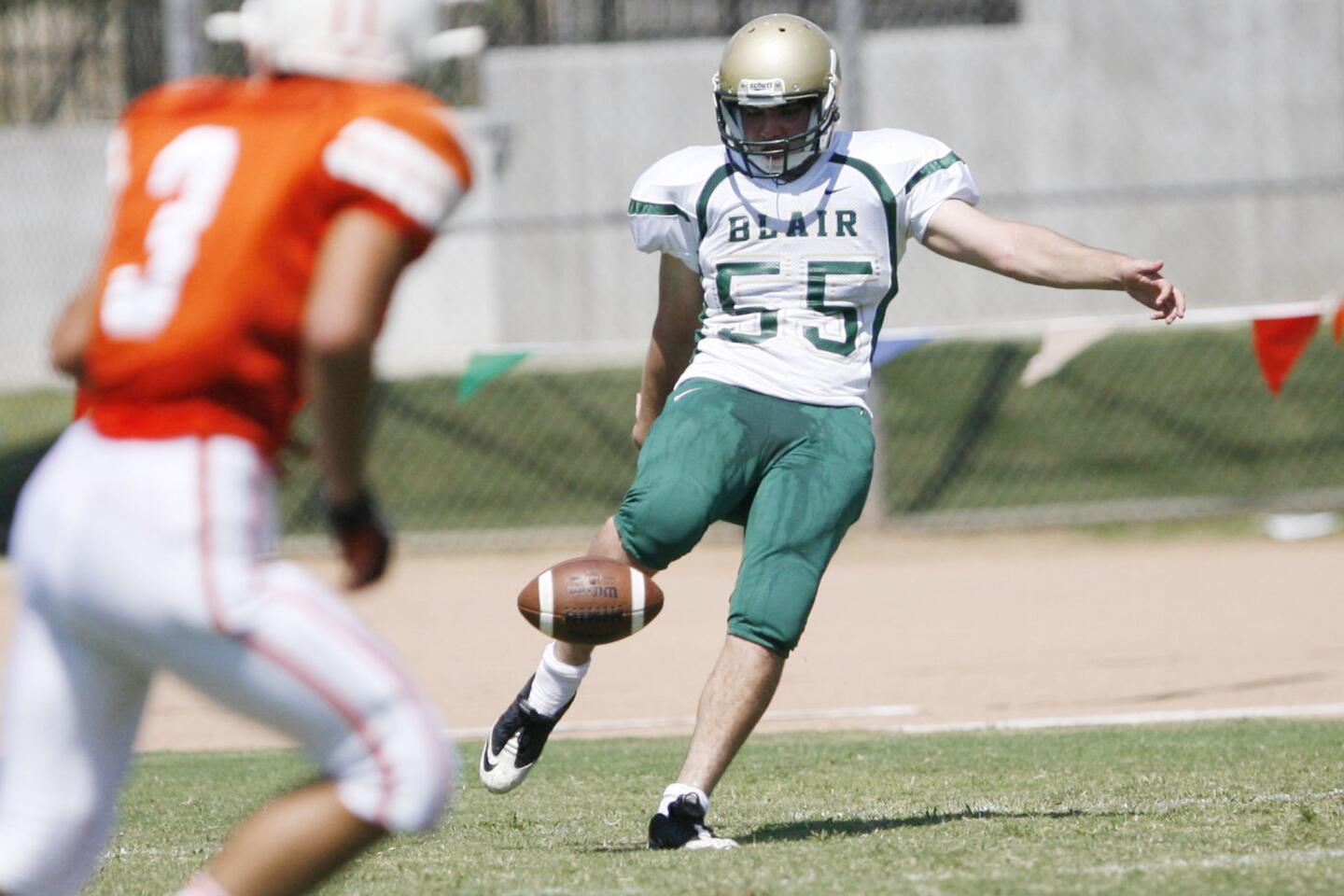 Blair's Sebastian McKimson, right, kicks off the ball during a game against Pasadena Poly at Pasadena Poly on Saturday, September 8, 2012.