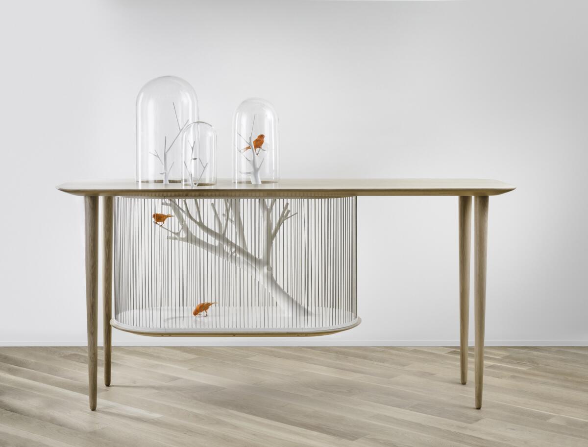 Designed as a one-off sculpture integrating a birdcage and glass-enclosed perches within a table, the Archibird by artist Gregoire De Lafforest is available to order from uk.galeriegosserez.com.