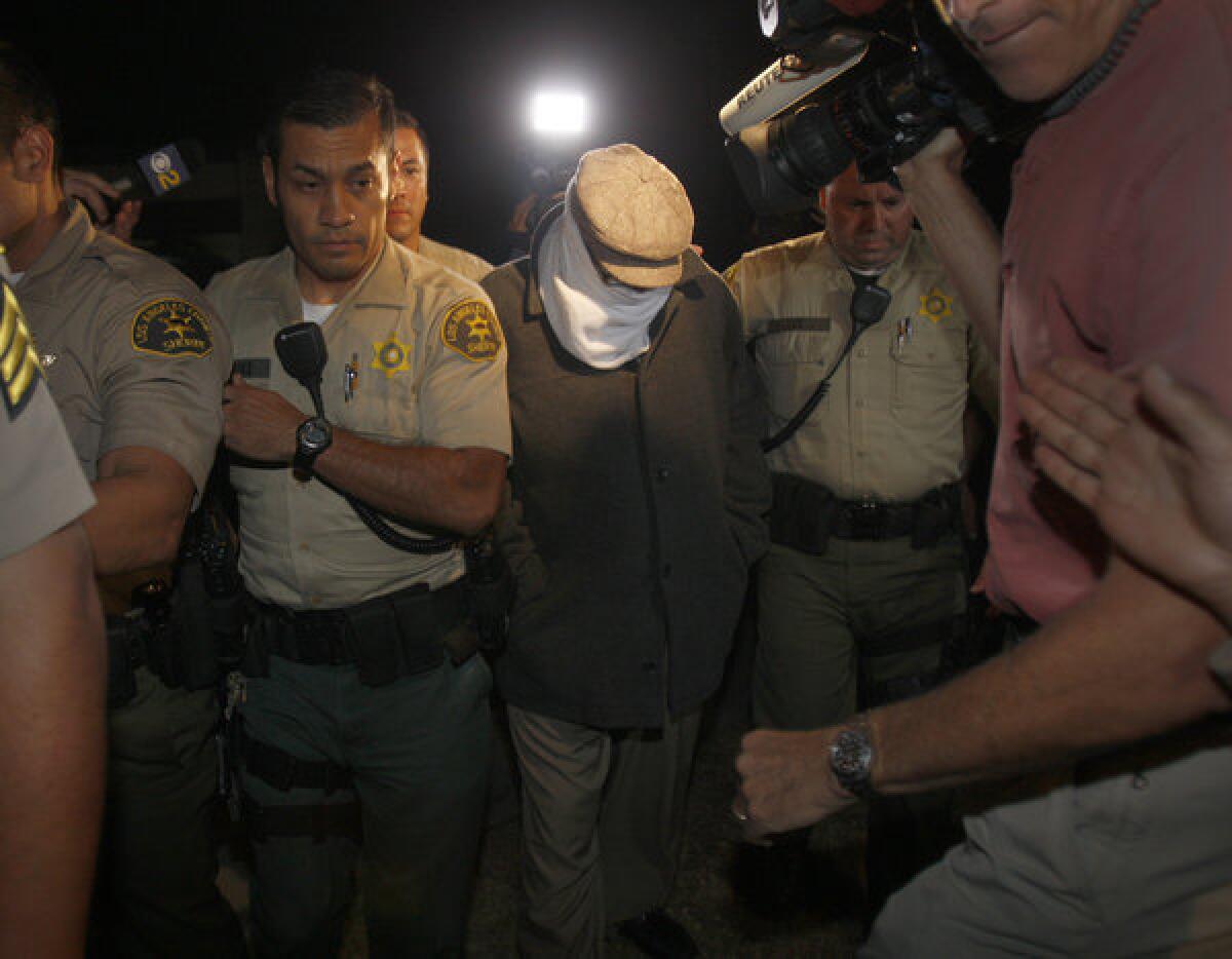 Los Angeles County sheriff's deputies take Nakoula Basseley Nakoula, the filmmaker behind "Innocence of Muslims," into custody in 2012 for a probation violation not related to the movie.