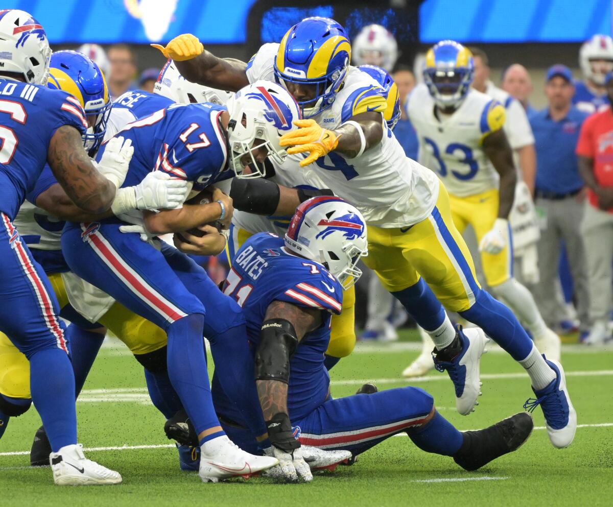 Rams defensive lineman Aaron Donald sacks Bills quarterback Josh Allen.