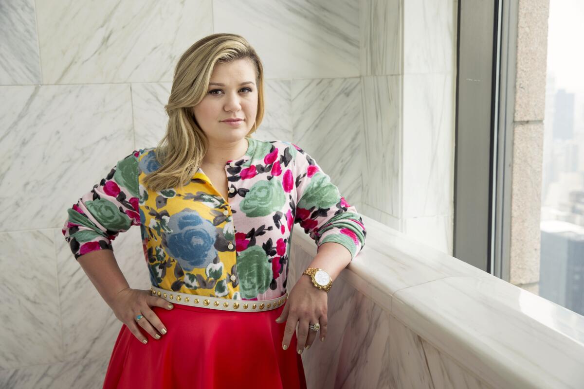 Kelly Clarkson's new album, "Piece by Piece," entered the Billboard 200 on Wednesday at No. 1.