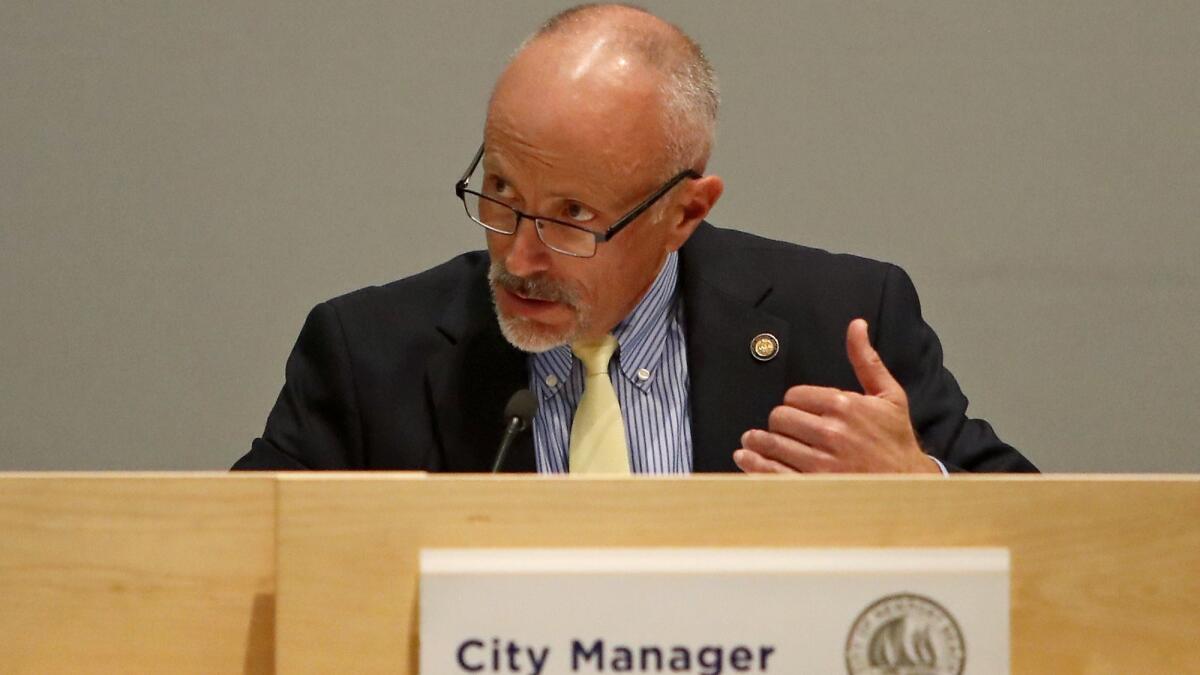 City Manager Dave Kiff speaks during Tuesday's Newport Beach City Council meeting. Kiff intends to leave Aug. 31.