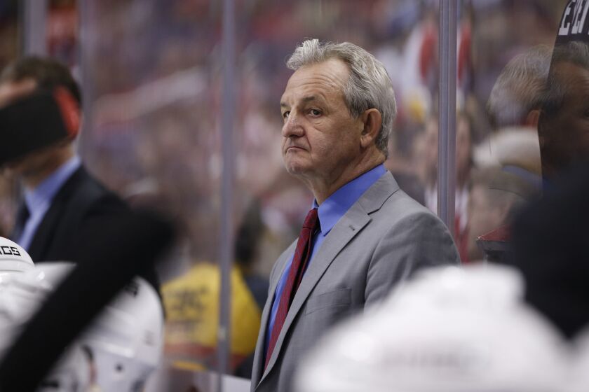 Kings Coach Darryl Sutter looks on during the third period of a game against the Washington Capitols on Feb. 16.