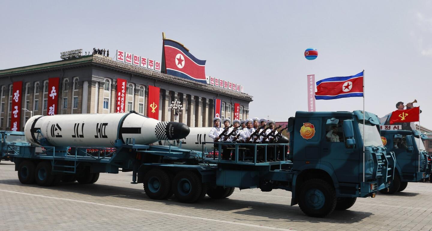 North Koreans celebrate the "Day of the Sun" festival commemorating the 105th birthday of former supreme leader and the nation's founder Kim Il Sung on April 15, 2017, as tension over nuclear issues rise in the region. North Korea displayed a new crop of missiles in the parade attended by current leader Kim Jung Un, grandson of Kim Il Sung.