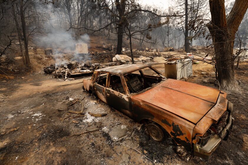LAKE HUGHES CA AUGUST 13, 2020 - The smoldering remains of a home on Pine Canyon Road that was destroyed by the Lake fire Thursday, August 13, 2020. There is 0% containment and the fire has scorched 10,500 acres in the Lake Hughes area. (Al Seib / Los Angeles Times)