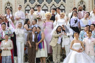 LGBTQ+ couples posing for a photograph