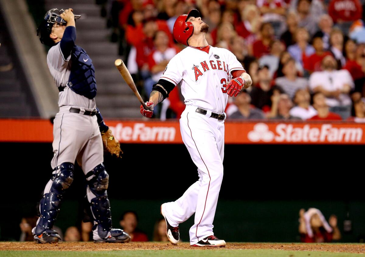 Angels' Josh Hamilton watches his infield popup that ended the eighth inning.