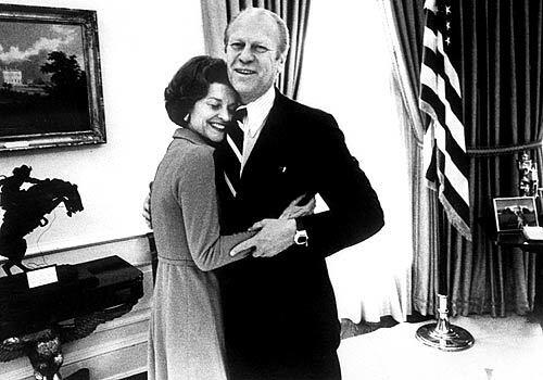 Betty and Gerald Ford hug in the White House in December 1974. During his tenure as president, she would outshine him in the polls. When he ran for reelection in 1976, one of the most popular campaign buttons read "Betty's Husband for President."