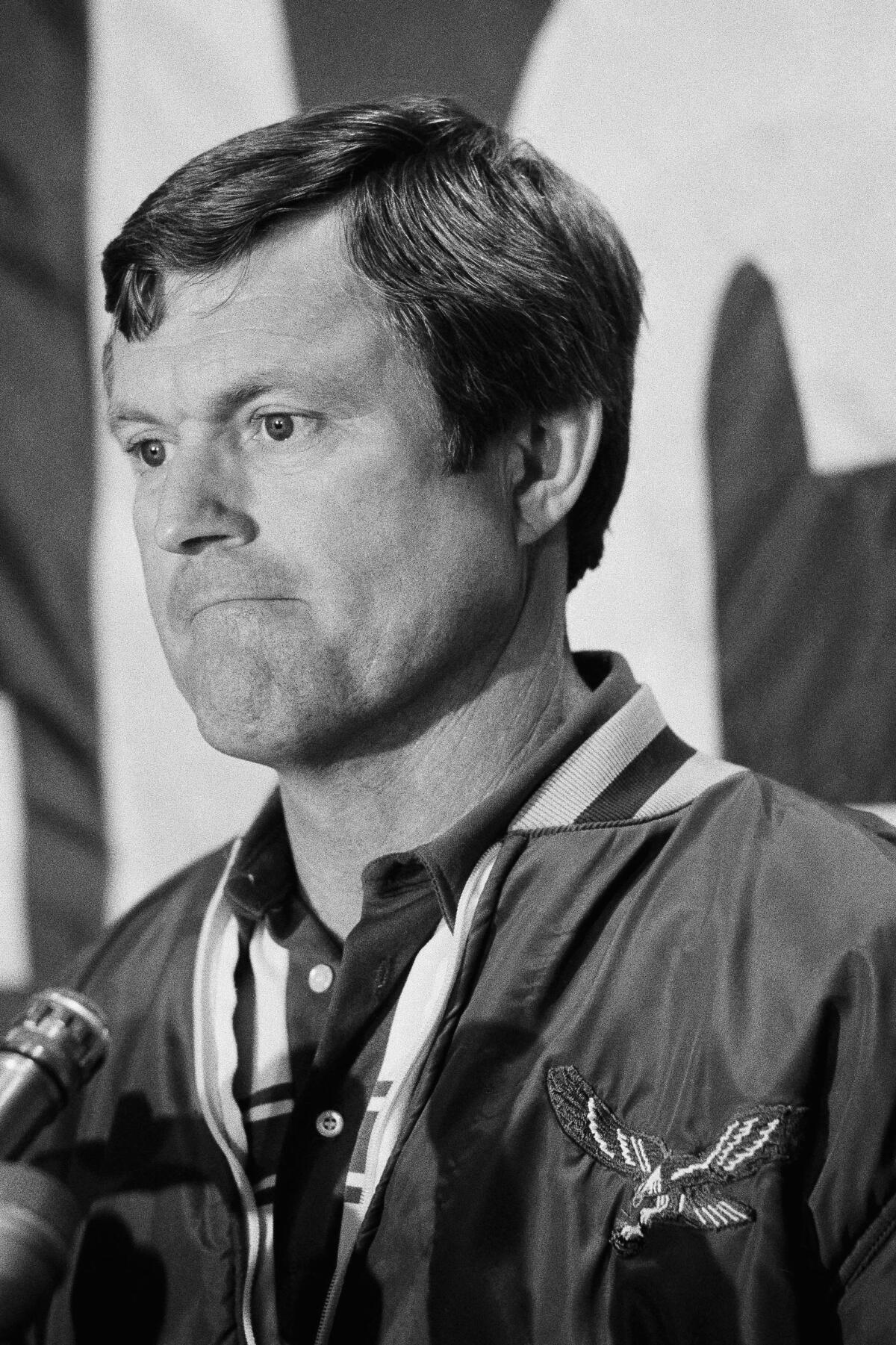 Eagles coach Dick Vermeil frowns as he prepares to answer a question during a  news conference in 1982.