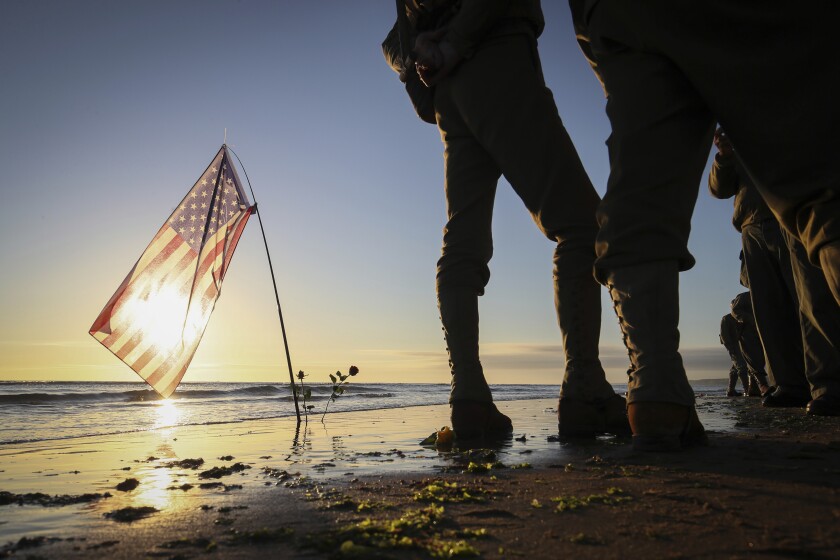 World War II reenactors gather on Omaha Beach on June 6, 2021/