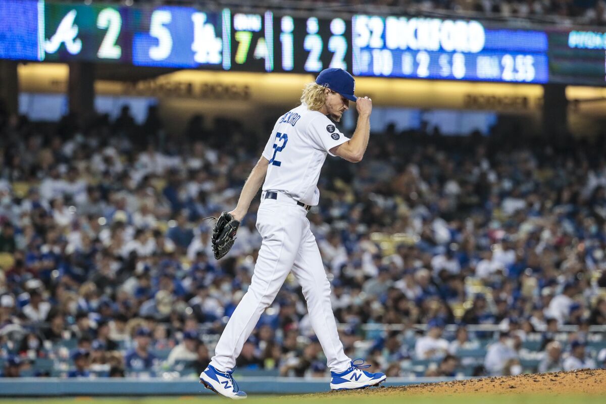 Dodgers pitcher Phil Bickford pitches the seventh inning against the Atlanta Braves.