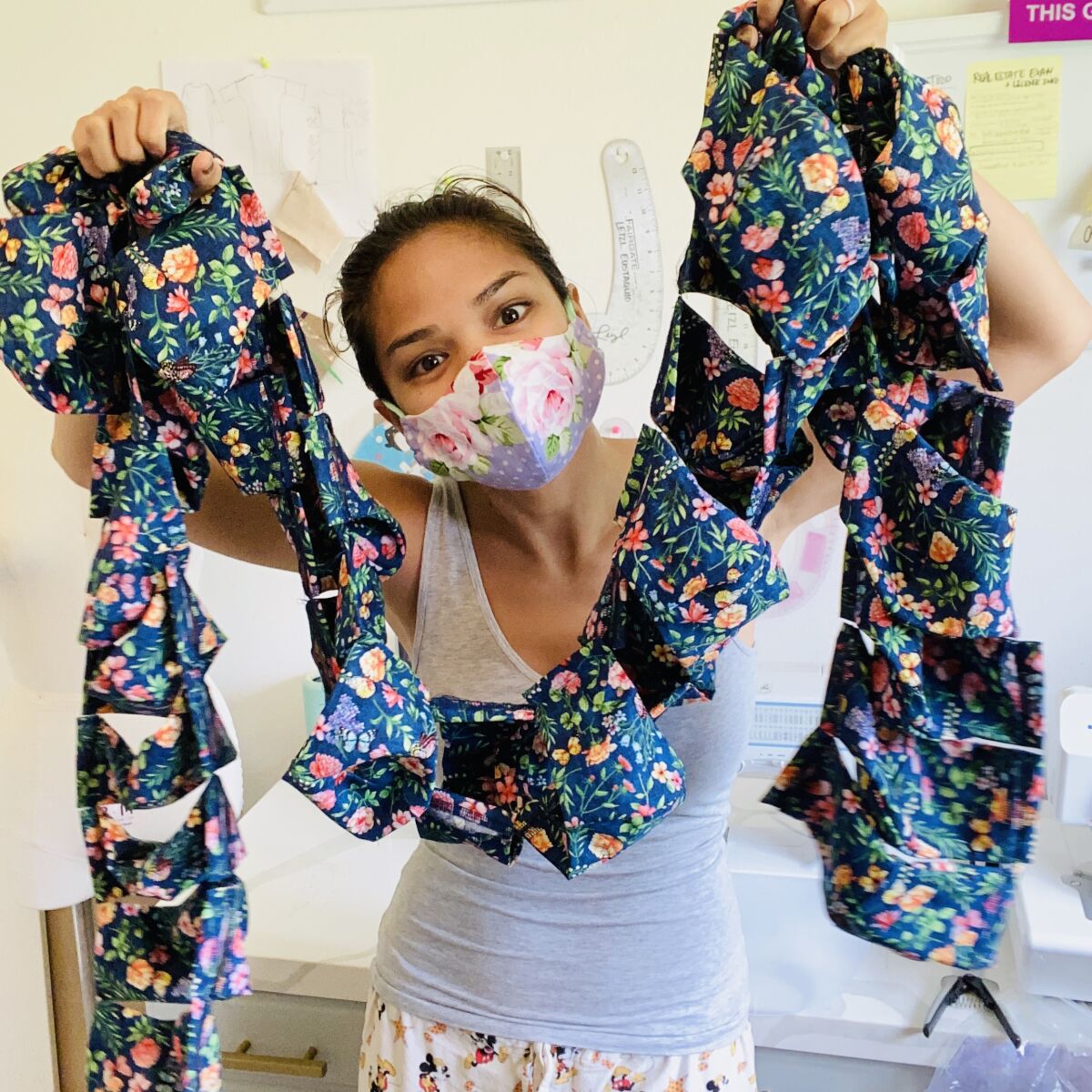San Diego fashion designer Leizl Totaram with her handmade face masks