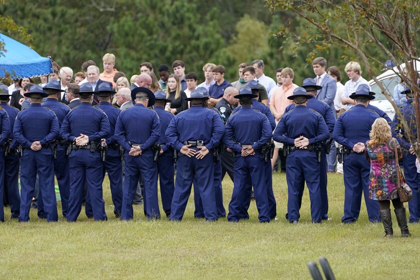 Louisiana state troopers attend funeral services for Master Trooper Chris Hollingsworth in West Monroe, La., on Friday.