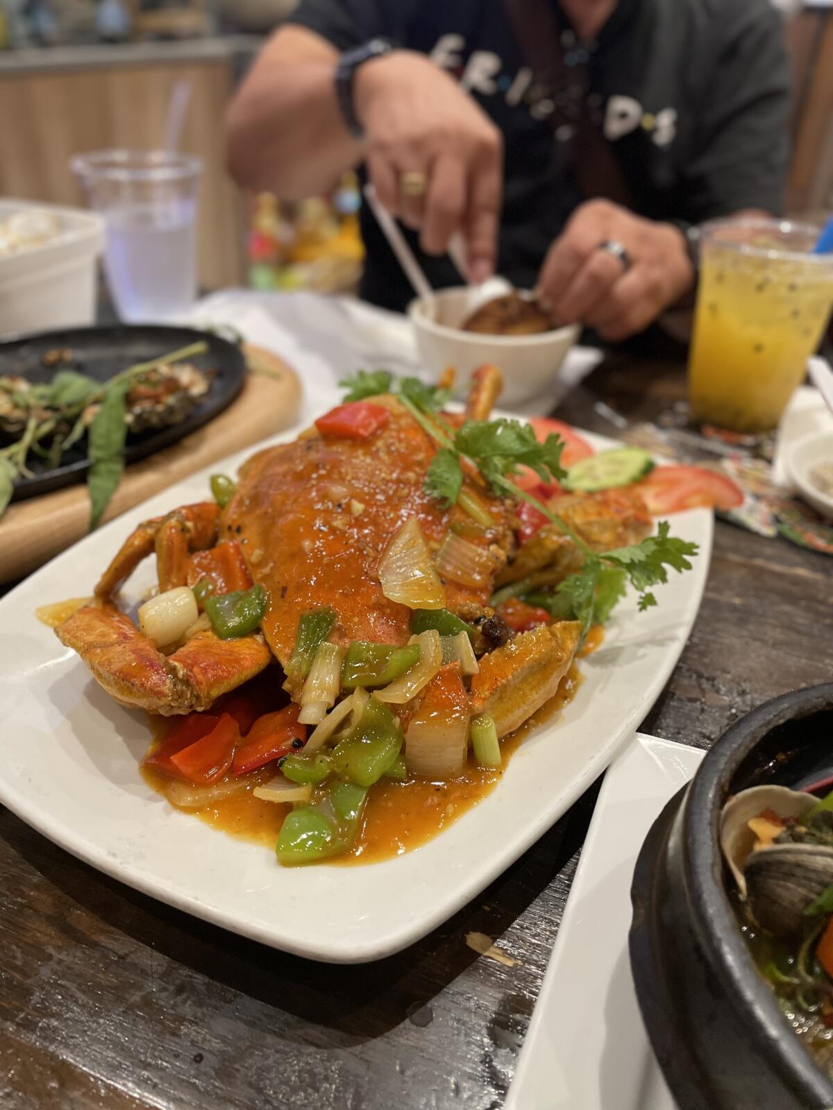 The House Special Crab at Oc & Lau will inspire oohs-and-aahs like nothing else.