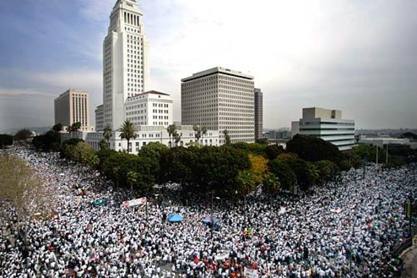 Thousands flood downtown streets near City Hall in March 2006 to protest immigration legislation. More demonstrations followed, in L.A. and around the country, as Latinos flexed their muscle.