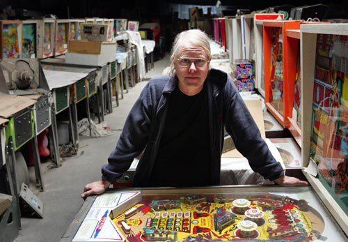Tim Arnold, 52, has about 800 pinball machines stored in his backyard hangar in Las Vegas. About 200 more machines reside in his Pinball Hall of Fame, where anyone with quarters can play them. What's the use of having cool games, he figured, if you play them alone?
