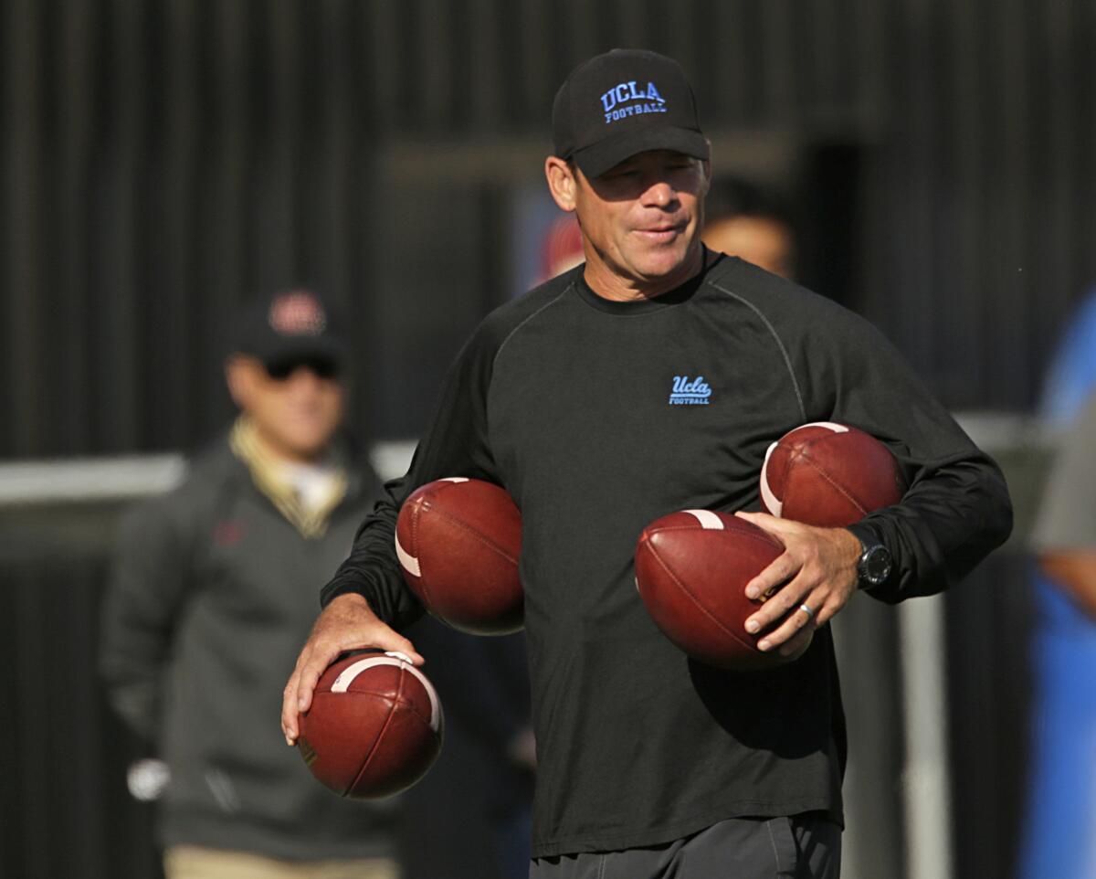 UCLA Coach Jim Mora at practice on April 20.