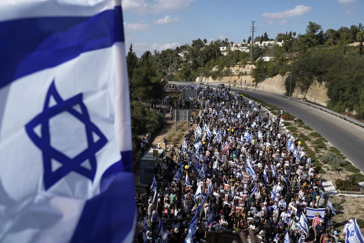 Thousands of people complete the final leg of a five-day protest march from Tel Aviv to Jerusalem.