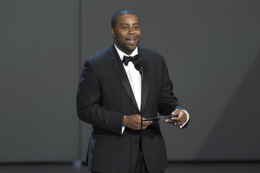 FILE - In this Sept. 17, 2018, file photo Kenan Thompson presents the award for outstanding drama series at the 70th Primetime Emmy Awards at the Microsoft Theater in Los Angeles. Thompson of “Saturday Night Live” and Hasan Minhaj of Netflix’s “Patriot Act with Hasan Minhaj” will headline this year’s White House Correspondents’ Dinner which takes place April 25, 2020. (Photo by Chris Pizzello/Invision/AP, File)