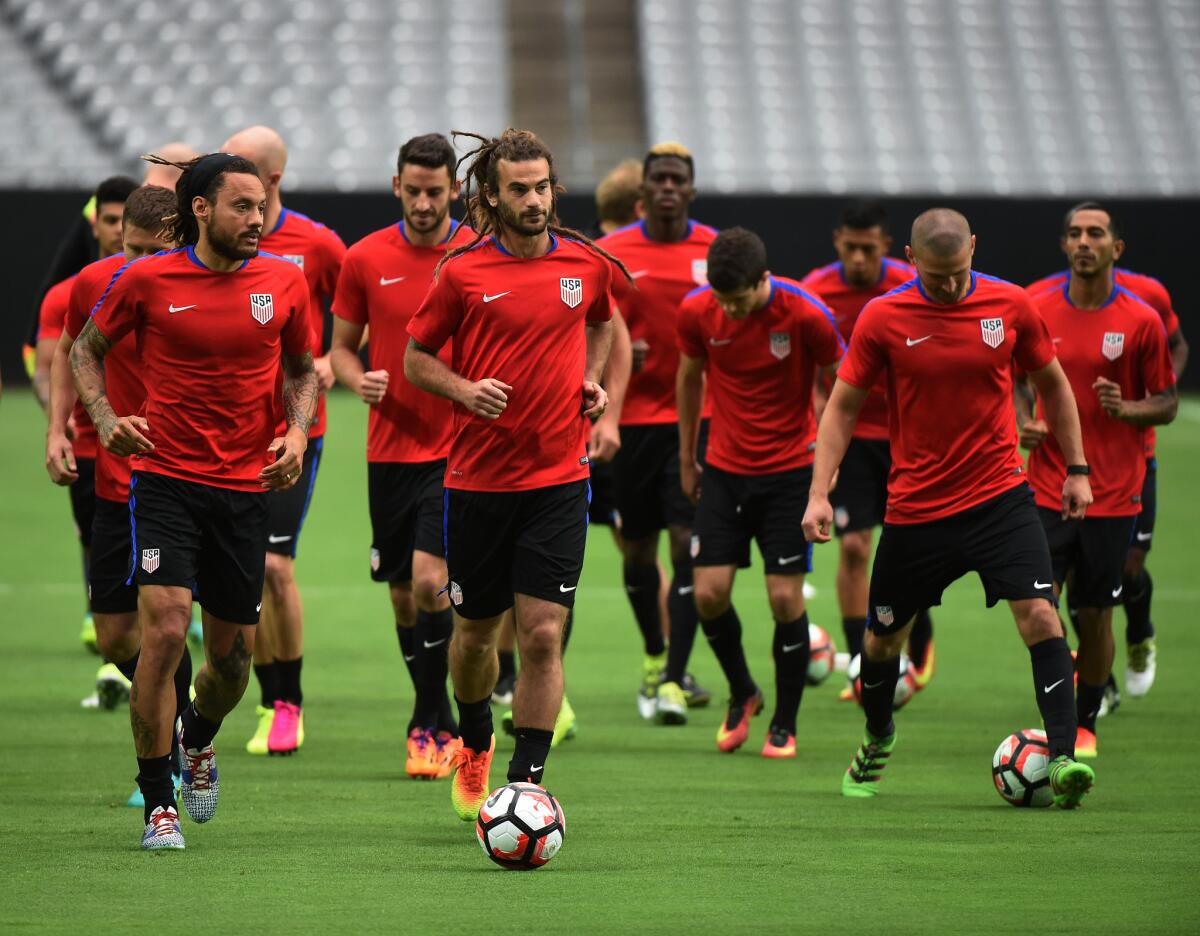 Jermaine Jones, left, and Kyle Beckerman, second from left, train with teammates at the University of Phoenix Stadium on June 23.