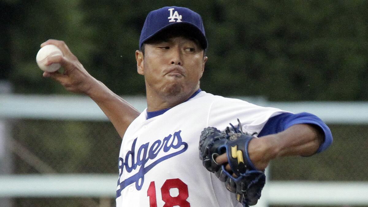 Dodgers starter Hiroki Kuroda delivers a pitch during a game against the New York Mets at Dodger Stadium in July 2011.