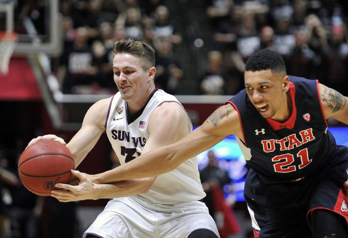 Utah's Jordan Loveridge tries to steal the ball from Arizona State's Bo Barnes in the second half Thursday night.