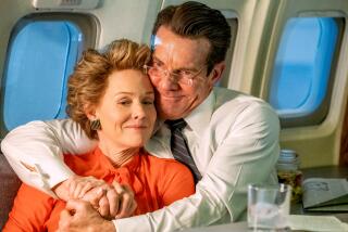 Penelope Ann Miller, left, and Dennis Quaid in a scene from "Reagan."